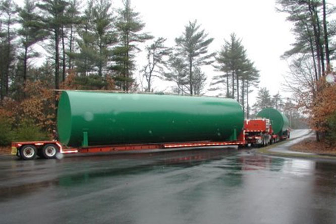 Tank Transported by Tractor Trailer Truck